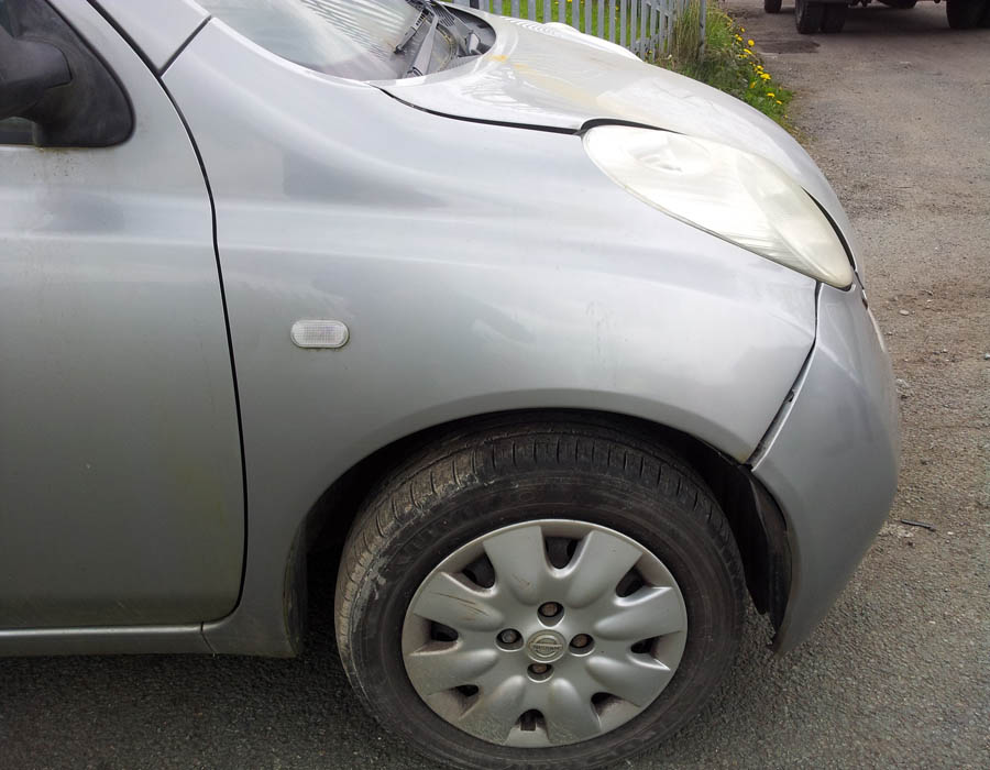 Nissan Micra E wing-driver-side-front